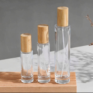 Botella de Perfume de vidrio transparente cilíndrica de alta calidad 30ml 50ml 100mL cuello de tornillo tapa de madera de bambú atomizador Uso de viaje - Product Image 2