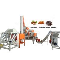 Ligne industrielle de noix de macadamia pignons décortiqueuse de pistaches Machine à décortiquer les noisettes, les amandes et les noisettes Machine à décortiquer les craquelins
