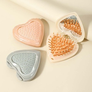 2025 noticias Popular dulce amor forma Mini portátil plegable tocador espejo peine lindo corazón patrón bolsillo plástico peine para el cabello - Product Image 1