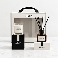 Coffret cadeau de parfums d'ambiance Aikun en verre ambré transparent avec bougie parfumée et diffuseur à bâtonnets noirs pour les événements de déménagement