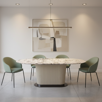 Table à manger ovale minimaliste italienne en marbre pour 6 personnes avec pieds en acier inoxydable pour villa et appartement