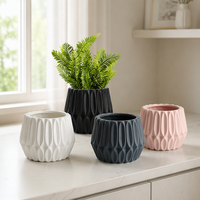 Vente en gros de pots à fleurs en céramique nordique gaufrée à motifs géométriques, respirants, multicolores, texturés, pour l'intérieur et le bureau