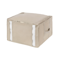 Sac de rangement sous vide compact de taille moyenne, format carré, pour vêtements, oreillers et autres articles.