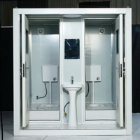 Cabine de toilettes préfabriquée à double poste avec lavabo intégré et ventilation pour camps de construction