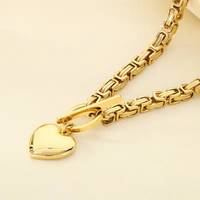 Ensemble de bijoux collier et bracelet en acier inoxydable plaqué or 18 carats en forme de cœur classique pour femmes
