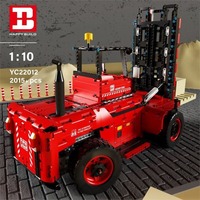 Série de véhicules d'ingénierie à blocs de construction assemblés Xinyu transfrontaliers, chariot élévateur télécommandé YC-22008 en plastique ABS, 14+