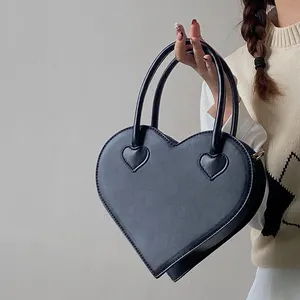 2023 Fashion black heart shape borse in pelle eleganti borse in pelle INS Chic Unique Clutch Girls Trendy Party Crossbody Bag