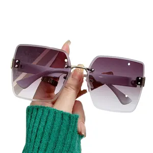 Dropshipping Factory New fashion rimless cut edge sunglasses street shoot hologram sunglasses retro sunglasses woman S65-S69