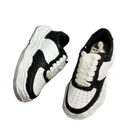 Baskets en cuir blanches et noires pour femmes et hommes, doublure en maille, décontractées, confortables, basses, pour le skateboard, chaussures de sport tendance