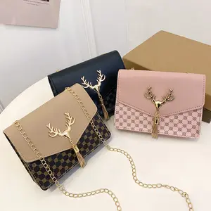 Nouveau style coréen petit sac à pompon pour femmes sac à bandoulière à chaîne en treillis de diamant à la mode sac carré imprimé décontracté