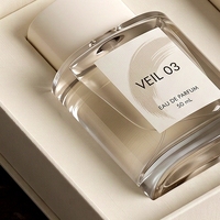 Boîte à parfum rigide de style livre blanc magnétique premium personnalisée avec insert ajusté pour présentation et emballage cadeau de parfum