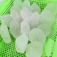 Vente en gros Quartz naturel brut de Nirvana Bouddha Guérison Cristal brut Forme de tour Pierre Top Cristal pour la décoration de cadeaux