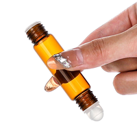 Flacon d'huile essentielle en verre ambré à double tête roll-on de qualité supérieure 10 ml avec diffuseur à bâtonnets et estampage doré pour emballage de parfum et cosmétiques