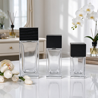Vente en gros de flacons de parfum rechargeables en verre transparent avec logo personnalisé, 30 ml, 50 ml, 100 ml, avec bouchon, flacon Woran