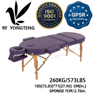 Lettino <span class=keywords><strong>da</strong></span> Massaggio <span class=keywords><strong>Pieghevole</strong></span> Portatile Premium Viola Ovale con Gambe in Legno di Faggio a 3 Sezioni, Poggiatesta in Pelle PU e Braccioli per Spa e Salone - Product Image 1