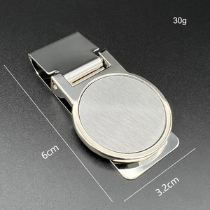 Minimalistische ronde portemonnee van roestvrij staal voor bankpassen, geld en tickets, met metalen geldclip. - Product Image 6