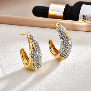 Boucles d'oreilles Huggie dorées avec cristaux de strass pour femmes, à porter au quotidien, plaqué or 22 carats, design micro-incrusté - Product Image 1