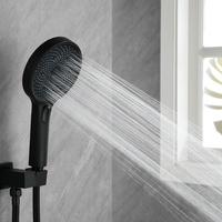 Système de douche noir mat mural avec vanne encastrée, grande pomme de pluie ronde, inverseur double fonction et ensemble de douchette à main ronde
