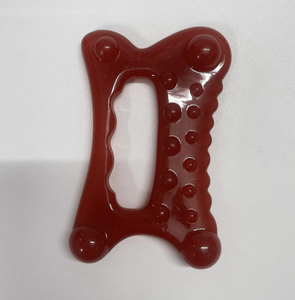 Herramienta Gua Sha multifuncional 9 en 1 de resina de color rojo para rostro y cuerpo - Product Image 1