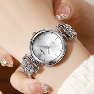 Reloj de pulsera redondo de acero para mujer, exquisito y de diseño exclusivo, reloj de cuarzo minimalista de alta gama para mujer - Product Image 1
