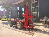 Foreuse de puits montée sur tracteur, entraînée par prise de force, avec changeur de tiges automatique pour l'irrigation agricole