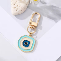 Nouveau Porte-clés en gros Œil turc irrégulier en émail doré, porte-bonheur, avec Cœur bleu et Œil protecteur, pour femmes, pendentif de sac et de pochette