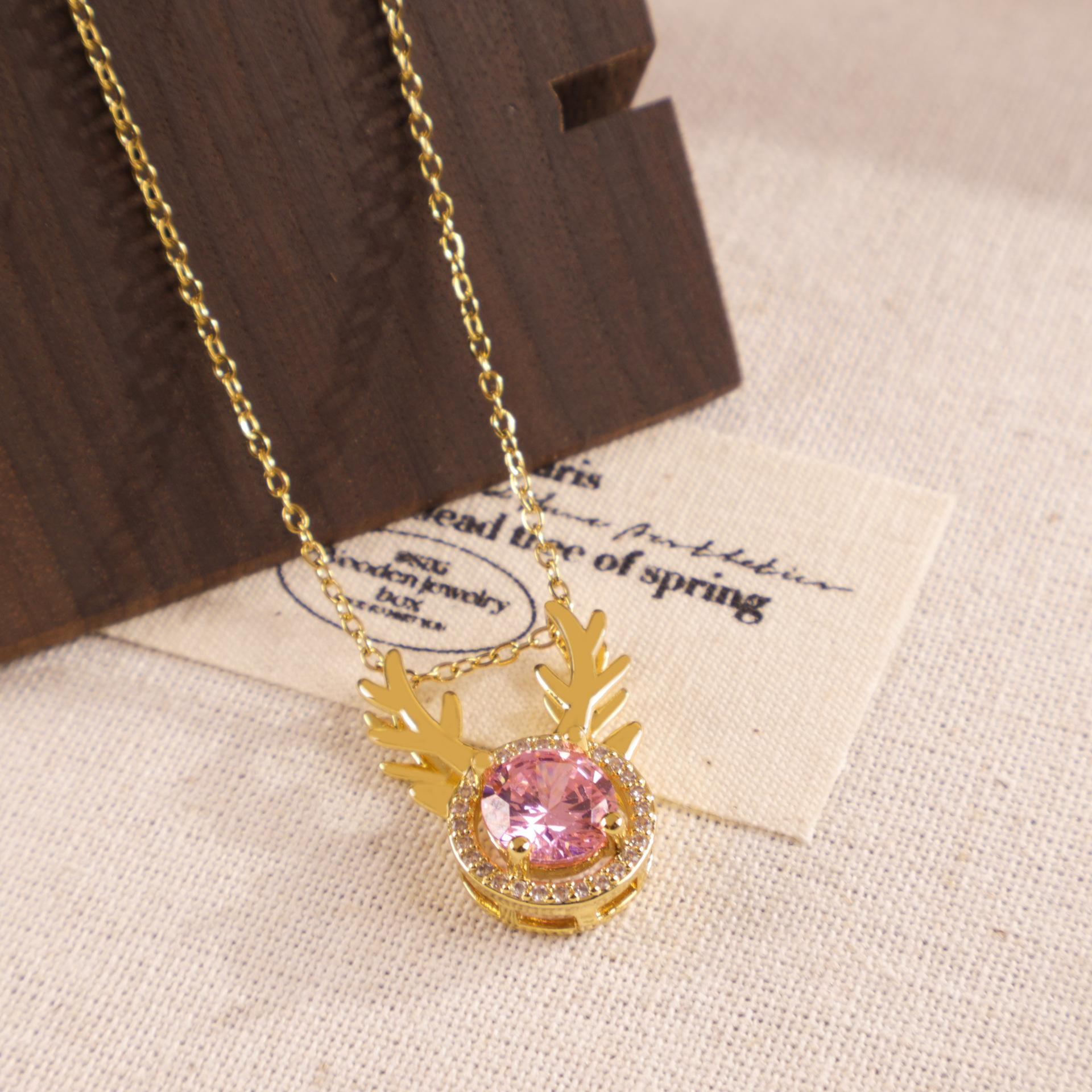 Xl25 collana rotonda rosa con corna di zircone color oro