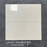 Carrelage mural en céramique aspect marbre beige brillant moderne 300x600mm pour la rénovation des halls et salles à manger d'appartements