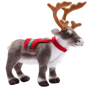 tuffed animals plush toys Reindeer stuffed animal elk deer doll poses with Christmas decorations