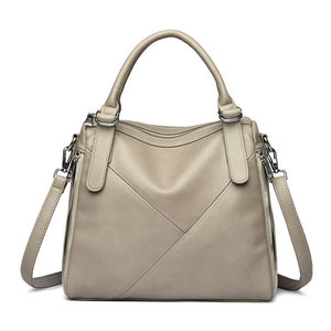 Nouveau style 2026 : Sac à main tendance pour femme, durable, avec rivets, design portable, antivol, en PU de haute qualité, motif géométrique - Product Image 1