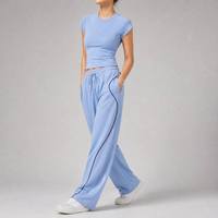 Ensemble de sport pour femmes, marque privée ODM, t-shirt côtelé à manches courtes, pantalon de jogging large, fabricant sur mesure