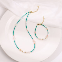 Collier et bracelet bohèmes en perles d'eau douce, chaîne en acier inoxydable doré, bijoux ethniques élégants pour femmes et jeunes filles, parfaits pour les vacances