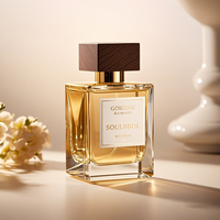 Flacon de parfum en verre de luxe personnalisé de 50 ml, à fond épais, avec dégradé doré, bouchon à bille et boîte diffuseur à bâtonnets