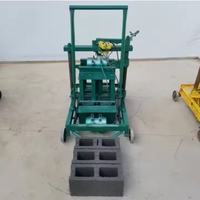 Machine manuelle compacte pour la fabrication de blocs de pavé creux en ciment 2-45 avec moteur et composants centraux stables