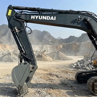 Excavatrice sur pneus Hyundai 210-9 d'occasion, modèle 21 tonnes, moteur Cummins 124KW, capacité de la benne 0,51-1,34m, boîte de vitesses, vente Shanghai