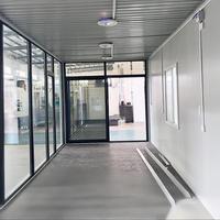 Maison préfabriquée moderne en conteneur avec grandes fenêtres en verre, portes pliantes, maison modulaire de luxe, bureau de jardin, maison d'hôtes