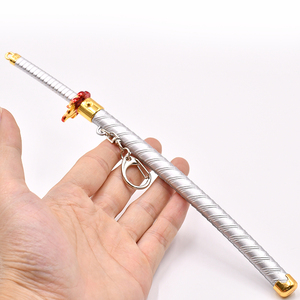 Nuovo Design Demon <span class=keywords><strong>Slayer</strong></span>: Kimetsu no Yaiba - Portachiavi Spada Anime in Lega di Zinco con Fodero Pop-up, Modello Rengoku Kyoujurou da 22 cm - Product Image 2