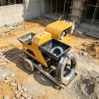 Machine à projeter le mortier verticale efficace 220V avec portée étendue pour la finition des murs extérieurs des bâtiments