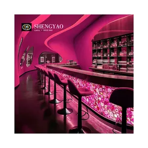 Mostrador de barra de piedra translúcida mármol rosa decoración pared ágata Rosa retroiluminada personalizada