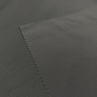 100% poliéster tejido elástico Softshell chaqueta tela impermeable a prueba de viento 3 capas Bonded Blackout al aire libre niñas bolsas