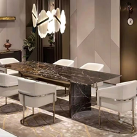 Ensemble de salle à manger en marbre noir et or de style luxe moderne, chaises de salle à manger rembourrées avec cadre en métal en forme de U pour hôtel haut de gamme