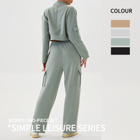 Ensemble de sport décontracté pour femme avec poches de style workwear, veste zippée à col montant et pantalon décontracté à jambe droite, ensemble deux pièces