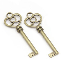 Clé squelette en métal décorative vintage en alliage de zinc, style bronze antique, personnalisée en usine, pour cadeau promotionnel 2026