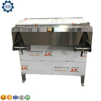 Décortiqueur automatique de noix de coco/broyeur de coquille de noix de coco/machine de décorticage de noix de coco