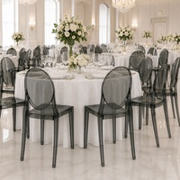 Chaise Ghost en polycarbonate transparent gris fumé pour événements, mariages, chaise de salle à manger d'hôtel à dossier ovale moderne