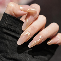 Faux ongles à presser en amande, base nude, ligne ondulée dorée, réutilisables, faits à la main