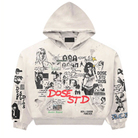Sweat à capuche oversize gris clair délavé style vintage, imprimé graphique intégral effet collage, streetwear, avec détails usés