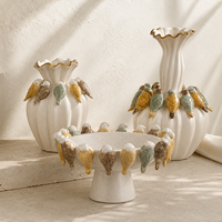 Vase à fleurs en céramique 3D en forme d'oiseau, inspiré de la nature, avec bord doré, pour décoration de table, console ou intérieur.