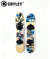 Planche à neige en bois imprimée graffiti avec sangles de fixation, pour le ski freestyle en descente et les loisirs hivernaux en montagne