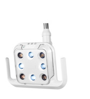 Fauteuil dentaire Foshan Medical Supply Charming avec plateau d'instruments intégré, lampe LED à capteur de luxe, équipement dentaire